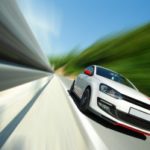 fast sports car on road Queener Law