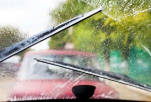windshield wipers in action on rainy day Queener Law