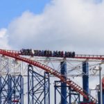 rollercoaster at amusement park Queener Law