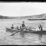 dad two kids and dog in canoe Queener Law