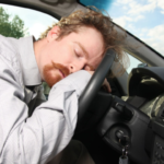 man asleep at the wheel Queener Law