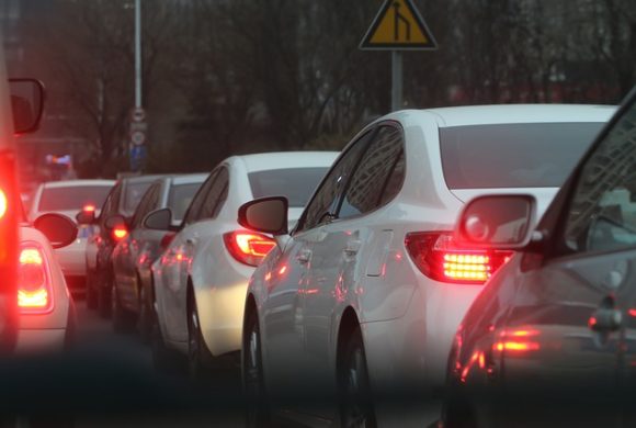 traffic jam at dusk Queener Law