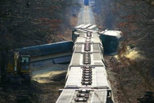 truck and train collide on train tracks Queener Law