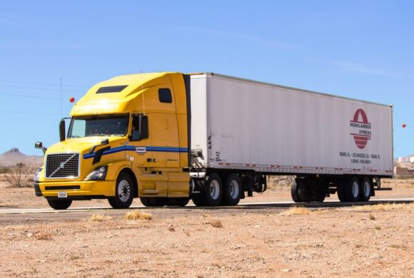 large semi truck on desert highway Queener Law