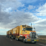 oversized load truck on highway Queener Law