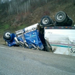 totaled semi truck rollover accident Queener Law